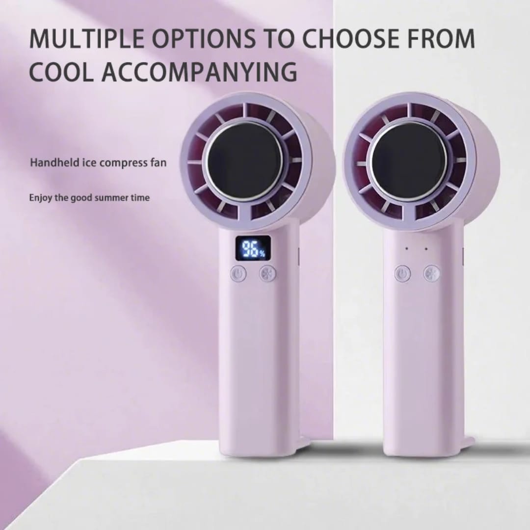 A white or pink handheld mini portable rechargeable fan with a built-in stand, blowing a cool breeze. The fan is lightweight and has a modern, minimalist design.