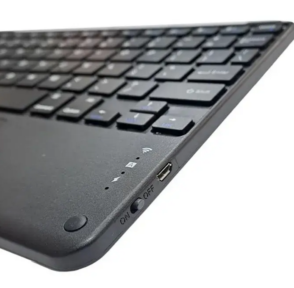 Black keyboard with power and USB ports on a white background