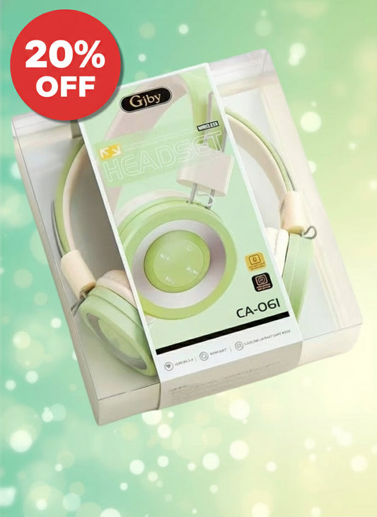 Green headphones with packaging on a light green background