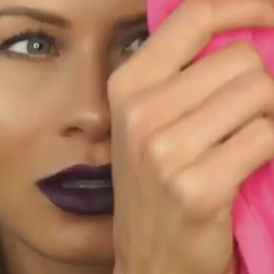 Woman easily removing makeup in Lebanon using only water and the Takawin towel.